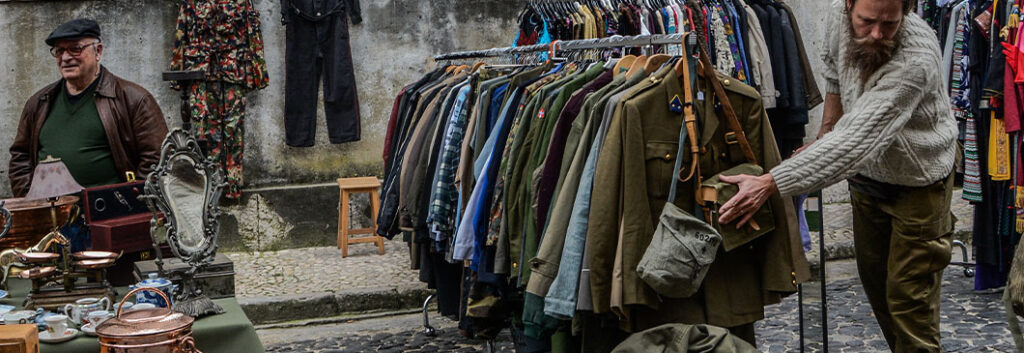 Second hand market stall of clothes and antiques